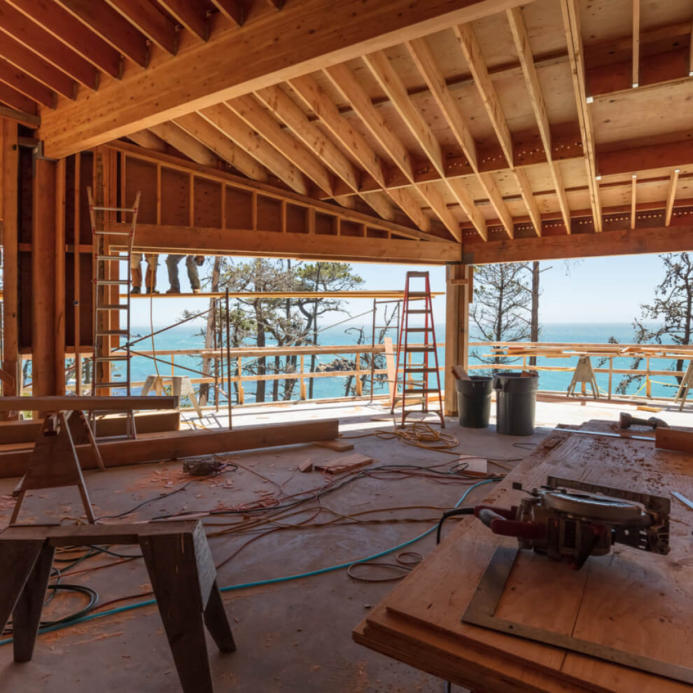 Wooden ceiling with intricate patterns and warm hues, adding a touch of elegance to the room.